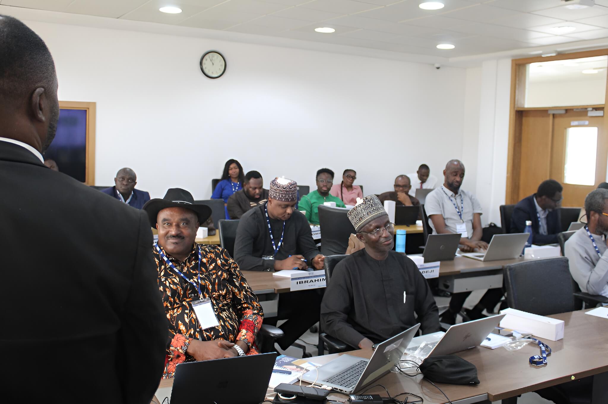 An image of a participants listening to a lecturer during a programme